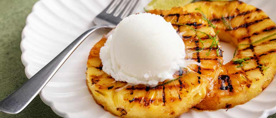 grilled pineapple with scoop of ice cream