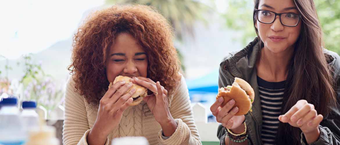 two girls eating lunch together