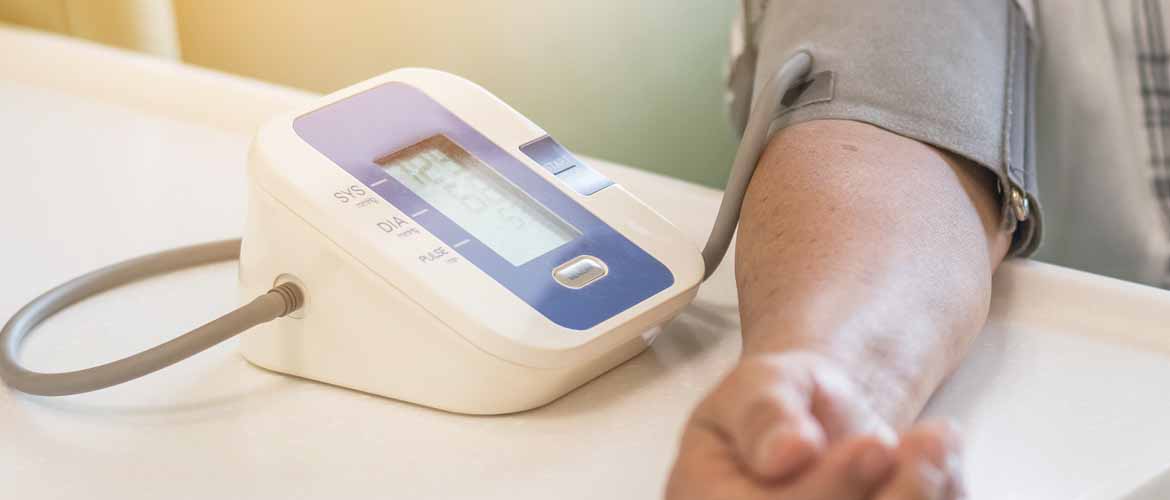 a man having his blood pressure checked