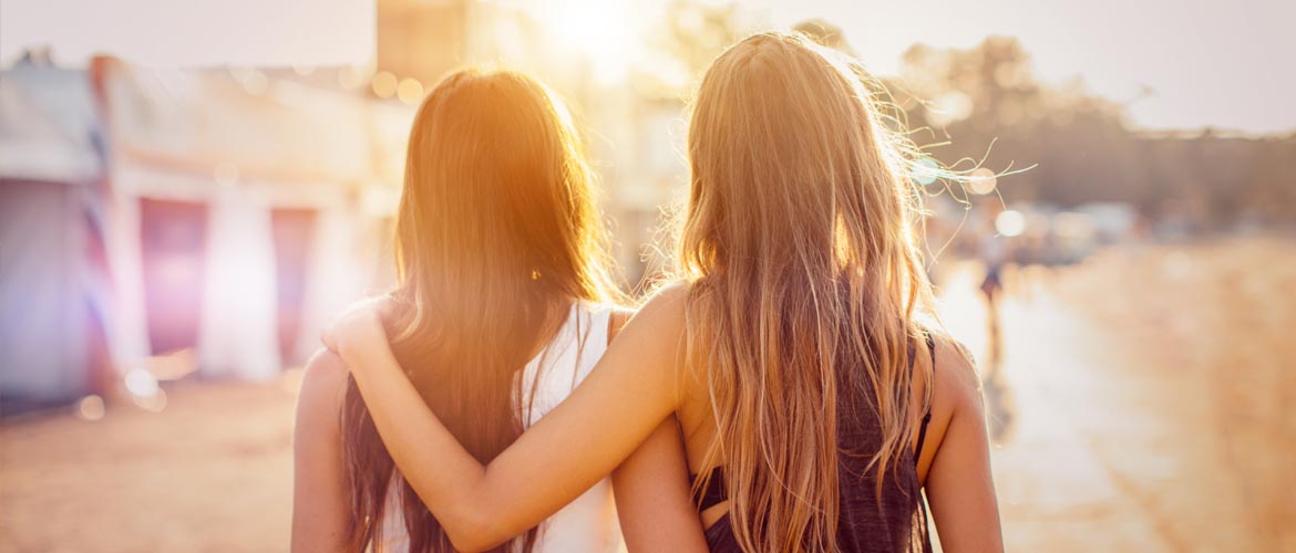 two ladies standing outside