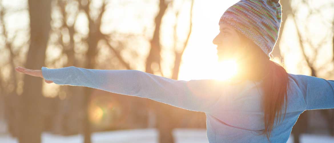 woman stretching after a workout outside